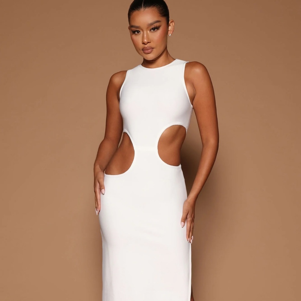 White peekaboo dress. Great quality, never been worn.